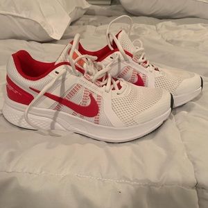 Red and white Nikes